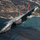 An F-35A gets ready to drop a GBU-12 weapon over the Sea Test Range, Point Mugu, California. This weapons test was one in a series of tests performed with the F35’s latest 3F software. Over the 31 calendar day “surge” period, the team accomplished 30 weapon releases (live fires and separations). Lockheed Martin photo by Chad Bellay.